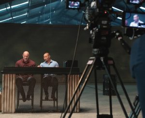 Bill Goldberg and Tu Lam preparing for a contestant