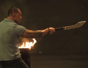 Tu Lam wielding the Ronin War Sword on the set