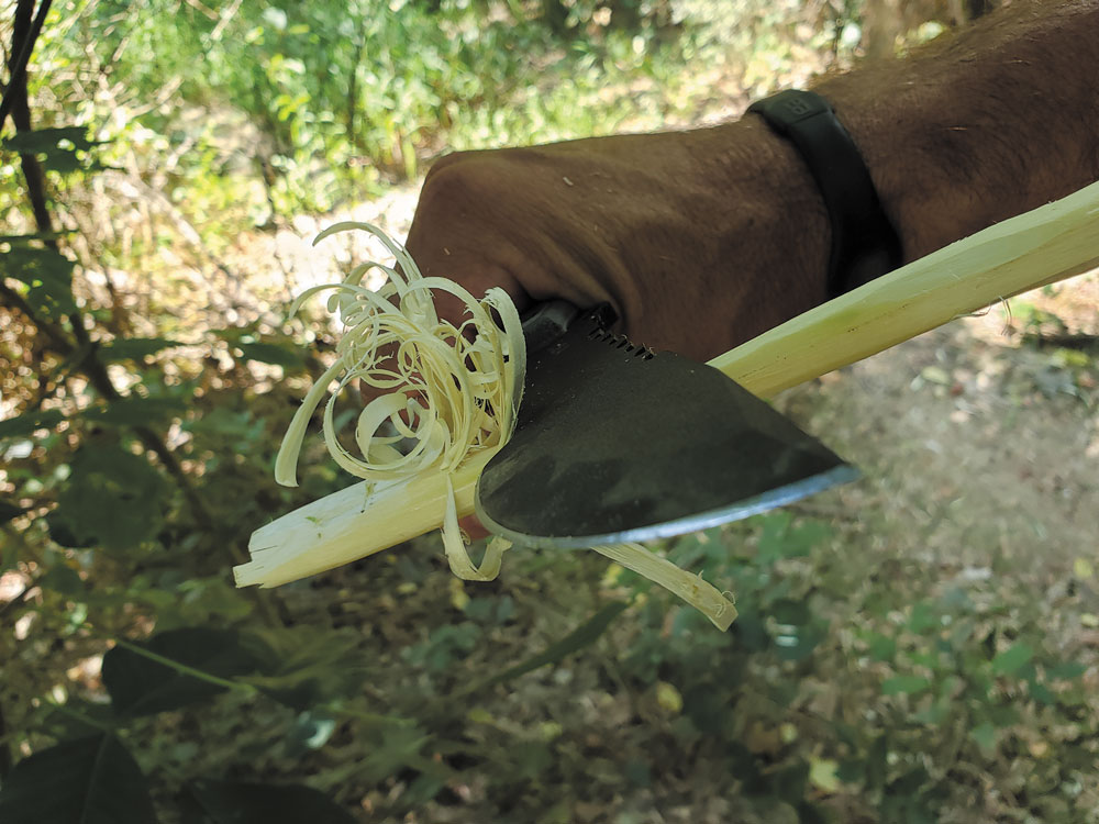 Knife creating feather stick