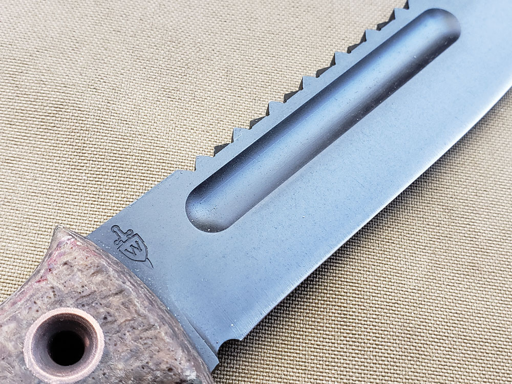 The Wenger Pilot Knife has a deep fuller that runs on each flat of the blade.