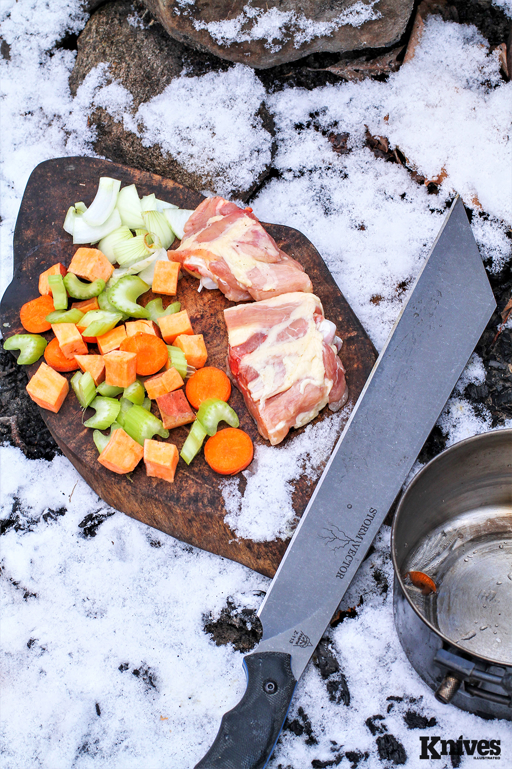 Making a winter camp stew, the TOPS Storm Vector processed chicken and vegetables, as well as firewood.