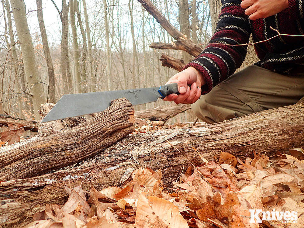 Here, the author uses a Y-crotch of a downed tree to chop into a large piece of oak to split it. The Y-portion of the tree both supports the work and acts as a safe haven for the follow through.