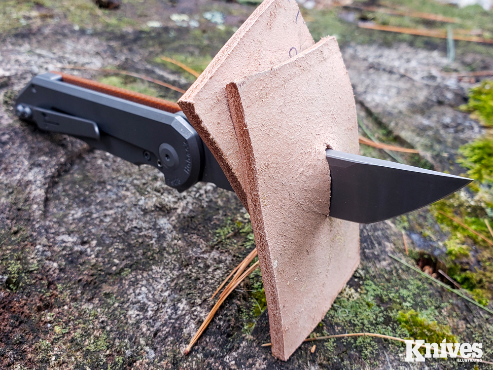 Using a piece of hard foam as a backer, the author tested the puncturing capability of the Radford folder with double stacks of heavy leather.