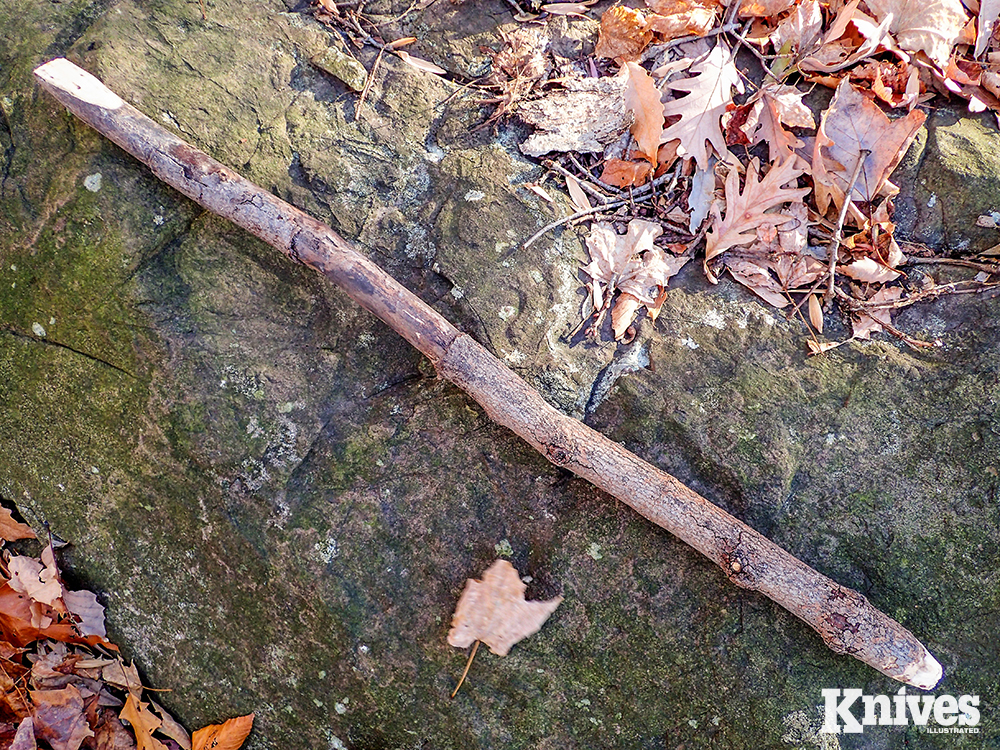A multipurpose camp tool for breaking up dirt, ashes, ice, or digging a trench.