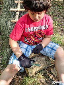 Safe knife skills start with cutting away from yourself, being mindful of the follow through, as seen here.