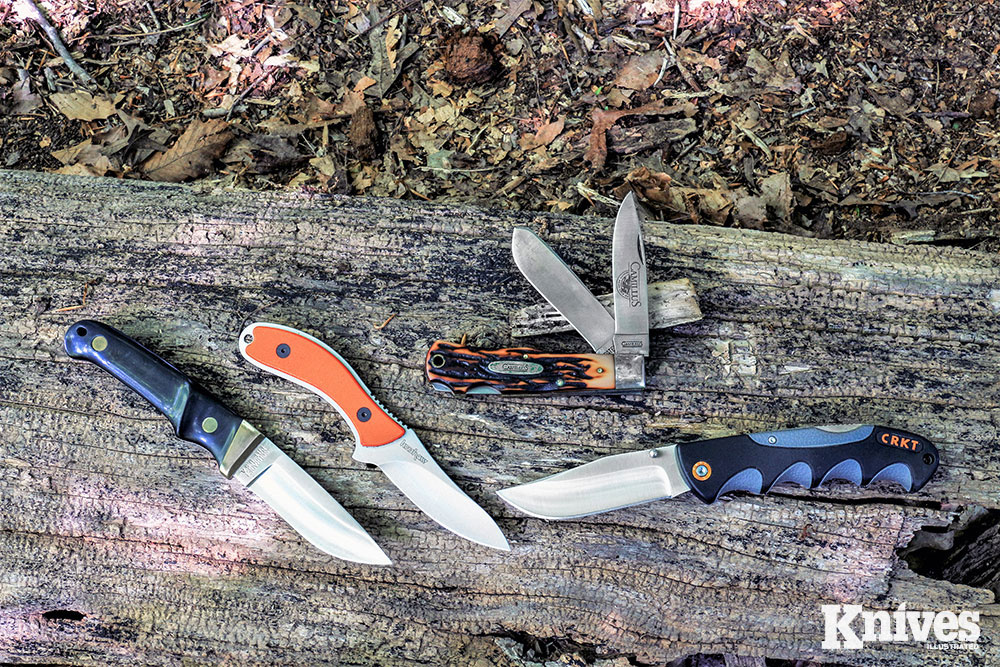 Shown (from the left) are: Schrade PH 1, Kershaw 1082OR Field Knife, Camillus two-blade lockback, and CRKT Kommer Free Range Hunter Folder.