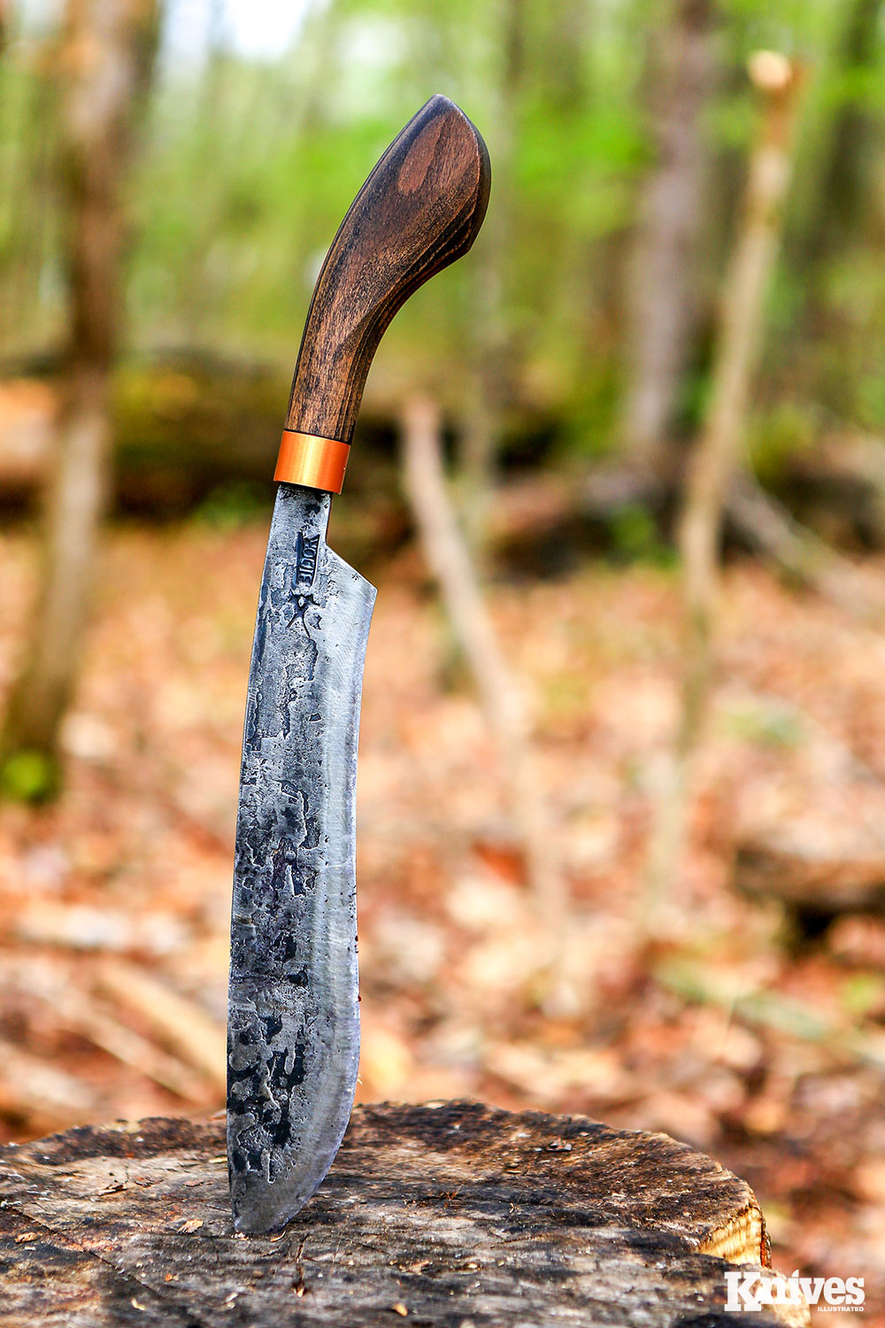 The My Parang Golok 135 has a 12 inch-long blade with 11 inches of cutting edge. 5160carbon steel on a 6.5 inch-long Eco Beech handle, with a copper sleeve over a single brass pin