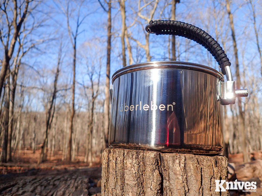 The Uberleben Kessel Pot is a stainless steel, 1.1 liters (37 fluid ounces) kettle and cook pot. It features an easy pour spout, hardwood lid knob, and weighs 16 ounces.