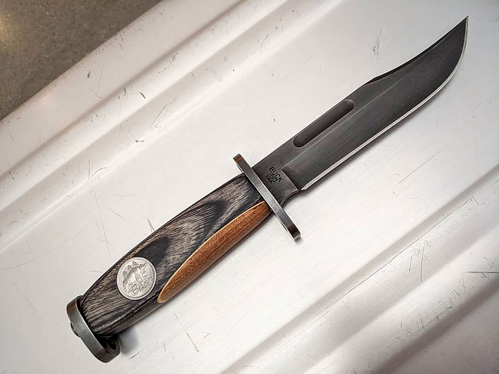 Buck 119 re-handled by Jeff Nowak with a Fred Bear bow riser