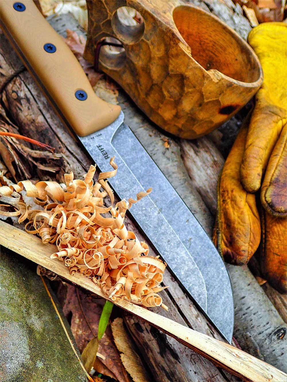 For fire prepping, the author tests every knife by making feather sticks.