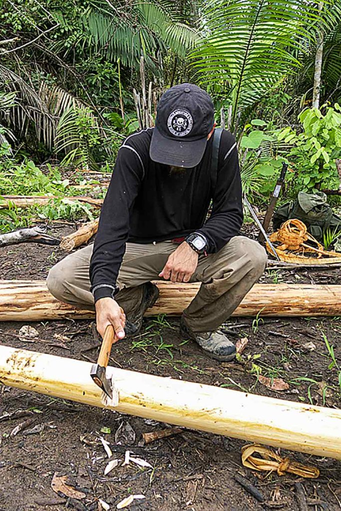 Author using the hatchet in Peru
