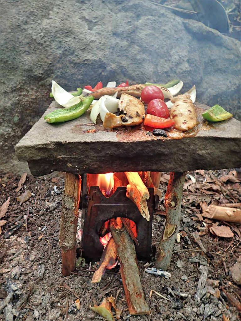 Cook on a wide stone with this primal cooking skill