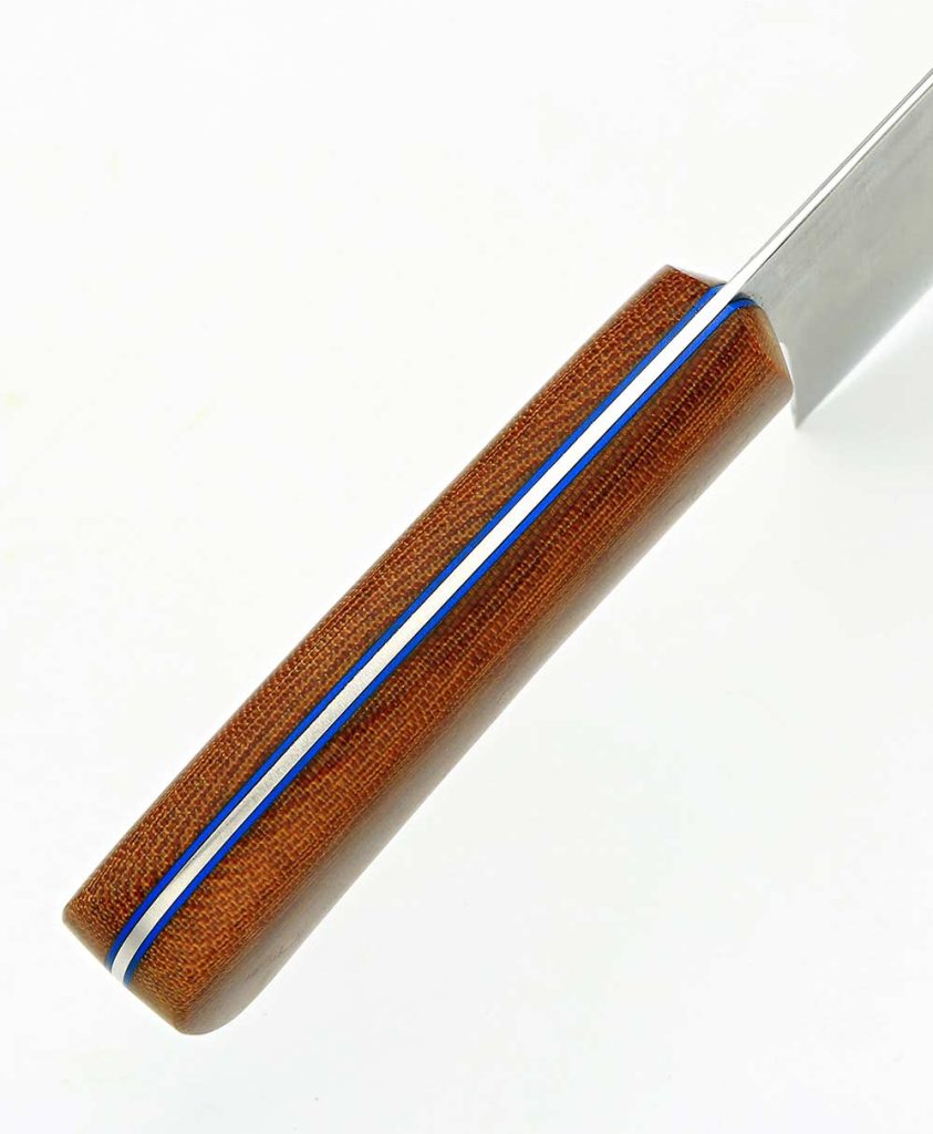 The handle features brown, crosscut canvas Micarta scales with blue G10 liners