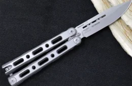 A stainless steel butterfly knife from Benchmade, with a skeletonized handle and drop-point blade.